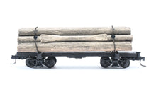 Load image into Gallery viewer, HOn3 Micro-Trains Various Roads 30’ Skeleton Log Car With Load
