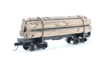 Load image into Gallery viewer, HOn3 Micro-Trains Various Roads 30’ Skeleton Log Car With Load
