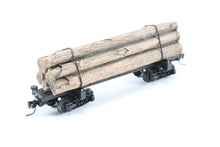 Load image into Gallery viewer, HOn3 Micro-Trains Various Roads 30’ Skeleton Log Car With Load
