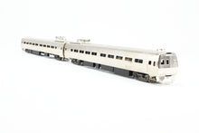 Load image into Gallery viewer, HO Brass Gem Models PC - Penn Central/Amtrak Budd &quot;Metroliner&quot; 2-Car Set (1 Powered/1 Dummy) Factory Plated, Unlettered
