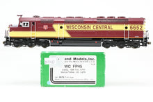 Load image into Gallery viewer, HO Brass OMI - Overland Models, Inc. WC - Wisconsin Central EMD FP45 FP Maroon/Yellow #6652 w/Lights
