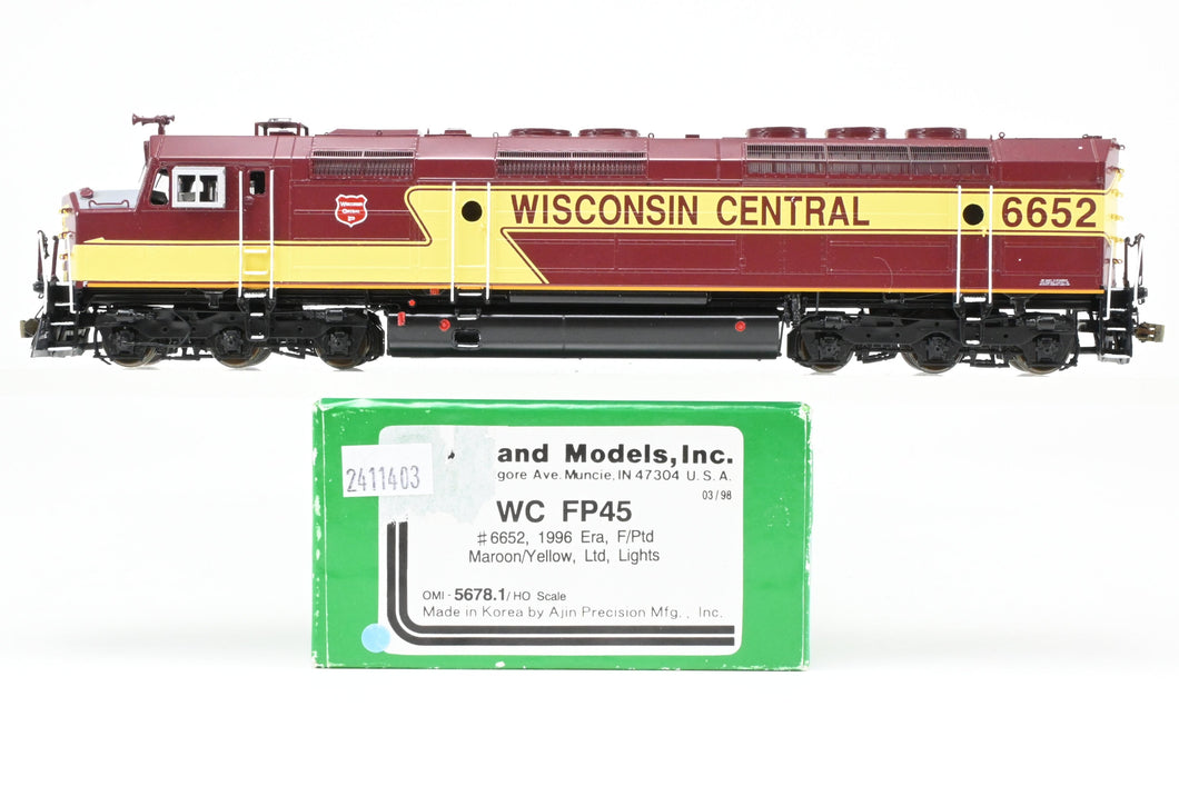 HO Brass OMI - Overland Models, Inc. WC - Wisconsin Central EMD FP45 FP Maroon/Yellow #6652 w/Lights