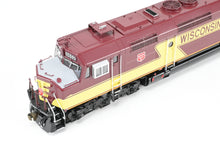 Load image into Gallery viewer, HO Brass OMI - Overland Models, Inc. WC - Wisconsin Central EMD FP45 FP Maroon/Yellow #6652 w/Lights
