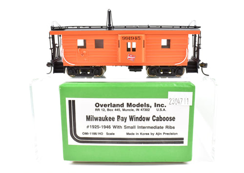 Copy of HO Brass OMI - Overland Models, Inc. MILW - Milwaukee Road Bay Window Caboose With Small Intermediate Ribs Pro-Painted